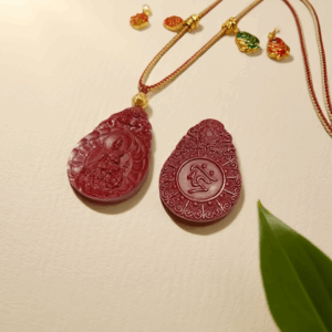 H39 Calm Observation as Before · A cinnabar pendant Pendant for the Year of the Snake.